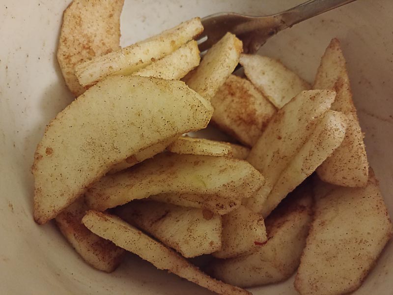 Toss Apples with Sugar and Cinnamon