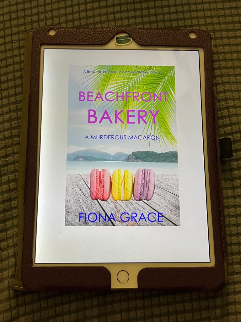 iPad showing the cover of A Murderous Macaron by Fiona Grace