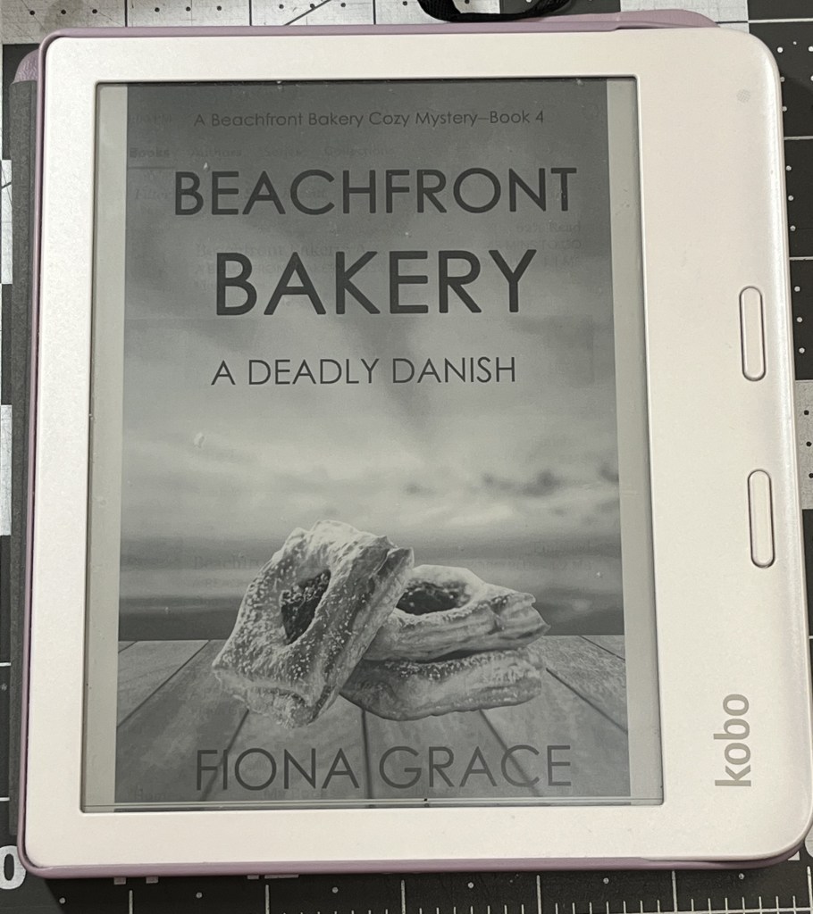 Kobo Libra ereader showing cover of A Deadly Danish by Fiona Grace