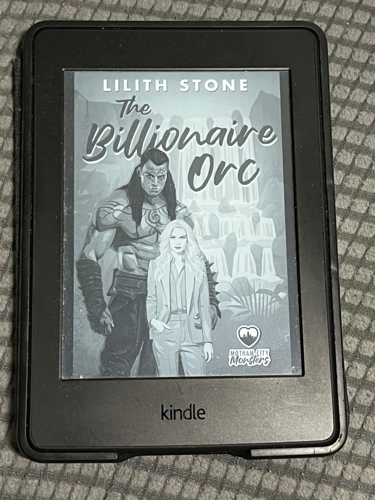 Kindle ereader showing cover of The Billionaire Orc by Lilith Stone
