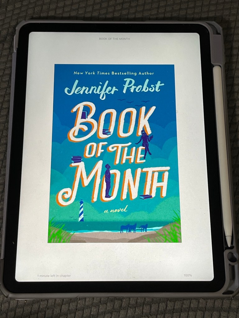 iPad showing the cover of Book of the Month by Jennifer Probst